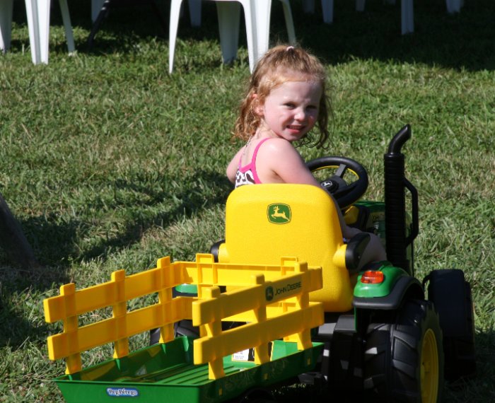 Amber takes a spin on the tractor